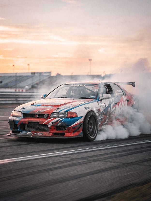 professional drift car racing smoke tires action shot